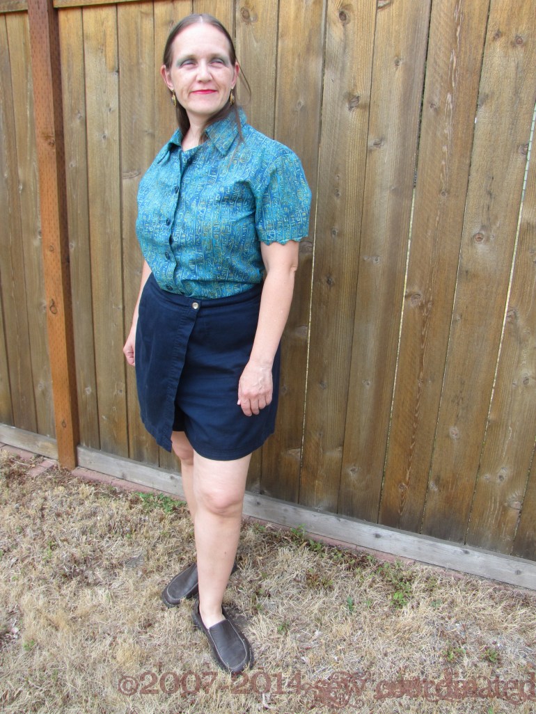 With the shirt tucked in