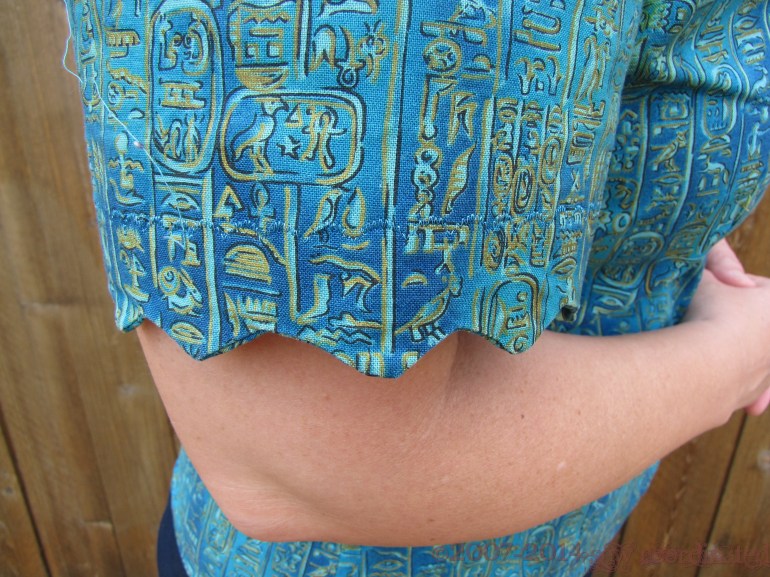 Closeup of the scalloped sleeve edge