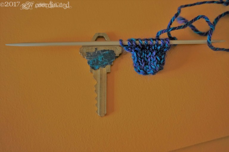 Key with Cozy on Needles